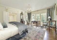 Awesome Large Pictures For Bedroom An Ornate Master Bedroom Suite With A Traditionally Patterned Rug And A Large Seating Area Near